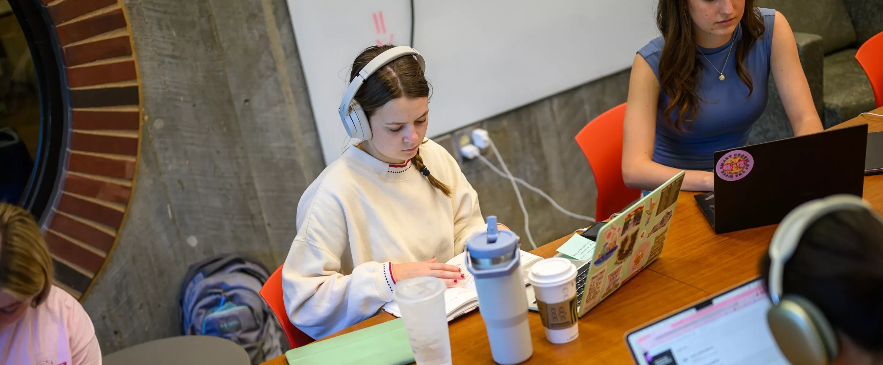 Students working in a study room in Ekstrom Library.