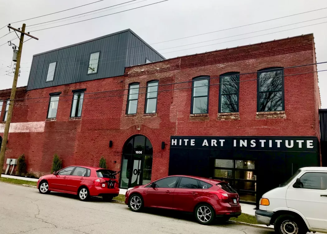 exterior of a brick building with the words 'hite art institute' on the side