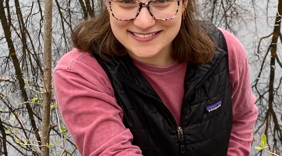 Shayna Earl holds salamander eggs at Horner Bird and Wildlife Sanctuary.